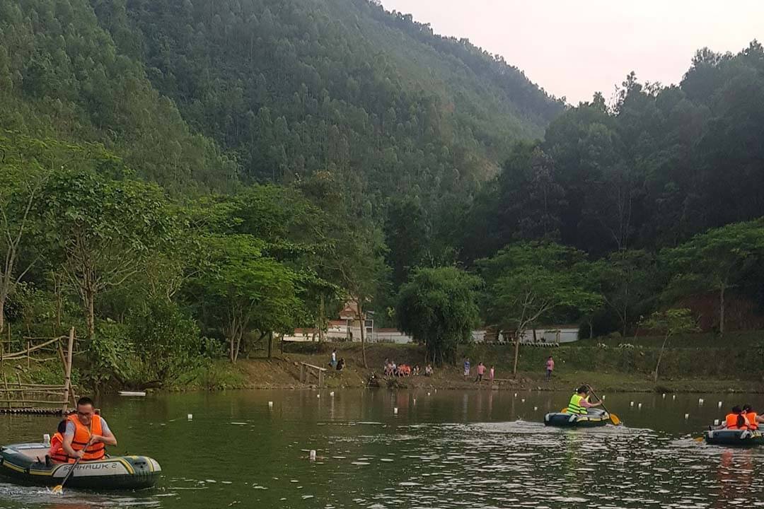 Paddle boating on camping lake